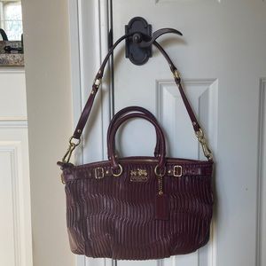 Coach Madison Sophia burgundy leather handbag.